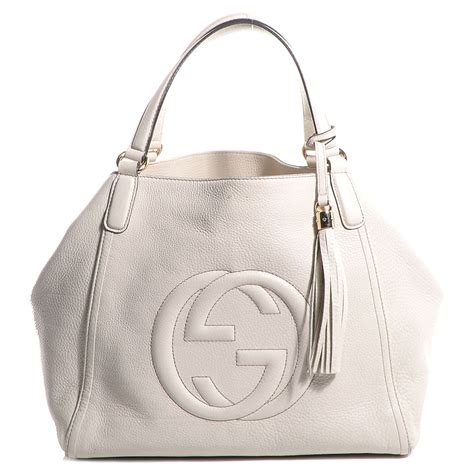 giacchetta gucci|white Gucci handbag.